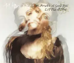 Two images of Madonna, with golden flowing hair and head tilted on opposite sides, are superimposed on each other.