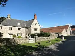 Manor Farmhouse and forecourt wall
