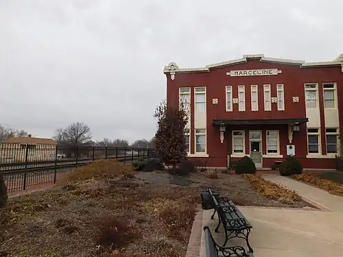 The former Atchison, Topeka and Santa Fe Railway depot became the Walt Disney Hometown Museum.