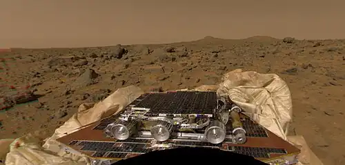 Mars Pathfinder showing one of three petals and deflated airbags