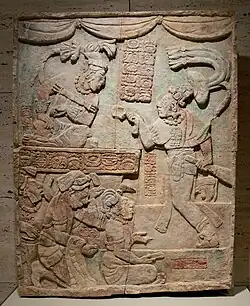 Relief showing Aj Chak Maax presenting captives before ruler Itzamnaaj B'alam III of Yaxchilan; 22 August 783