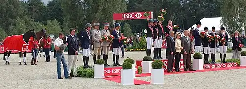 top three teams at the team medal ceremony