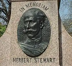 A colour photograph of a memorial to Stewart