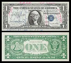 A 1957-A $1 Silver certificate short snorter flown in 1961 on Freedom 7 by Alan Shepard.