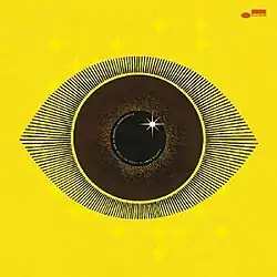 A stylized graphic of an eye on a yellow background