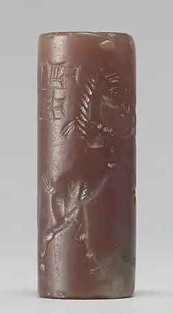 Mesopotamian cylinder seal-(view Side B), with a "stamping form" for cuneiform signs, requiring the cuneiform text be inscribed "in reverse" to 'roll-stamp' the correct cuneiform direction.