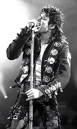 Michael Jackson singing into a microphone