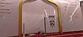The qibla of the mosque with minbar present.