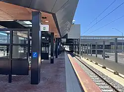 Morley station platform in a highway median strip