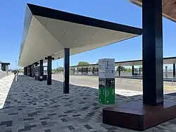 A bus interchange with a full length shelter