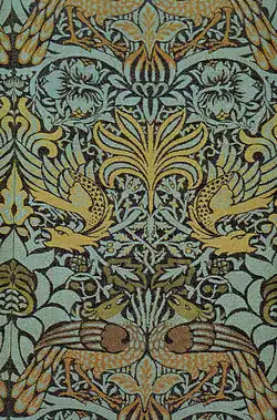Fabric design Peacock and Dragon by William Morris (1878), an example of decorative graphic design. Such designs were revived during the 1960s with the emergence of the hippie movement.