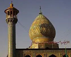A picture of the dome and minaret of the tomb of Sayyid Alauddin Hussein