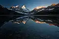 Lake Magog reflections of Mount Magog (left), Mt. Assiniboine (center), Wedgwood Peak (right)