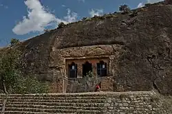 Two rock cut temples with inscriptions in Varunachimalai