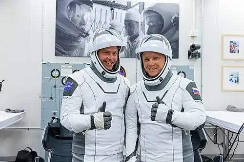 Hague and Gorbunov suited up in the Operations and Checkout Building before launch