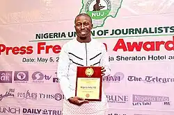 Manager, Nigeria Info FM Abuja Femi D Amele shortly after receiving the NUJ 2021 Press Freedom Awards