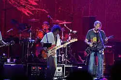 Ralph Molina (drums), Billy Talbot (bass), Neil Young (guitar) in 2012