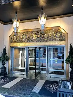 Art Deco square medallions above the entrance of the Hilton Cincinnati Netherland Plaza (West 5th Street no. 35), Cincinnati, US, by Walter W. Ahlschlager and Delano & Aldrich, 1931