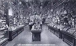A Woolworth's postcard of the store interior at Christmas season, in New Albany, Indiana. Vintage postcards were typically seen in Woolworth stores. ca.1910.