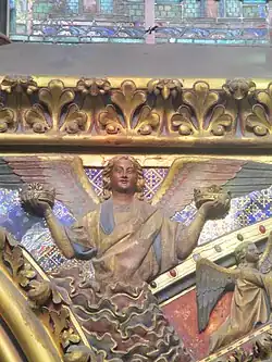 Carved angel on the alcove of the King, north wall