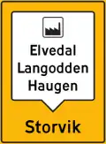 Collective guide sign[N 1] Shows destinations that may be reached through the same road at the next crossroads or exit.