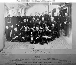 Staton as a midshipman, standing third from the right in the back row in this photograph of the officers of the protected cruiser USS Chicago, ca. 1903.