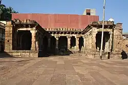 Old Temple with adjacent ancient structures, gateway to the left side of the entrance to the modern Banashankari temple