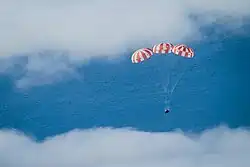 Orion descending to the Pacific Ocean