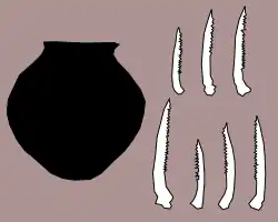 Image 15Carved catfish bones, and jar discovered in Maadi (from Prehistoric Egypt)