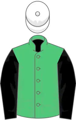 Emerald green, black sleeves, white cap