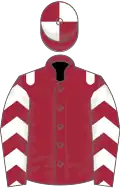 Maroon, white epaulets, chevrons on sleeves, quartered cap