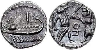 Ancient Phoenician Shekel (coin) depicting King Tennes fighting a beat (lion) on its face and a war galley on its reverse