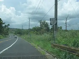 Northbound shield in Morovis with the shape of the island of Puerto Rico