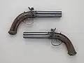A pair of caplock twister pistols