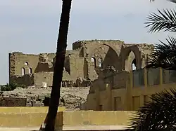 View from afar of the ruined walls of the palace.