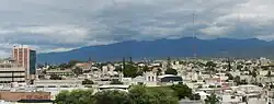 Urban landscape of the city with the Ambato mountain in the back.
