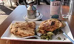 Pair of panuozzi with a forkful of fillings, Utrecht, 2024