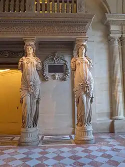 Renaissance caryatids of the musicians' loft in the Louvre Palace, Paris, by Jean Goujon, 1550[20]