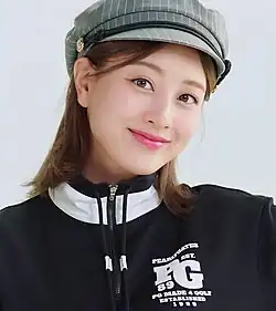 A screenshot lf Jihyo modeling for Pearly Gates Korea 2023 Fall Collection.
