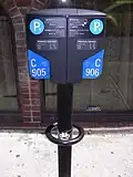 Car parking meter with integrated bicycle lock ring (Montreal, Canada)