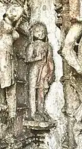 An idol of a Śvetāmbara monk wearing colpattā carved on the outer walls of a Jain temple at Pavagadh Hill