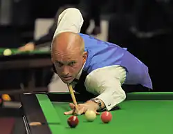 Peter Ebdon playing a shot