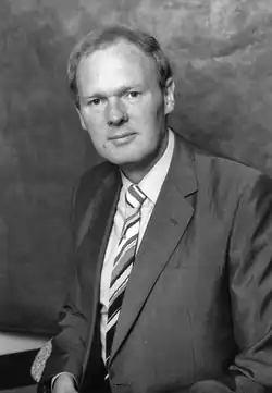 A professional photograph of Peter George.