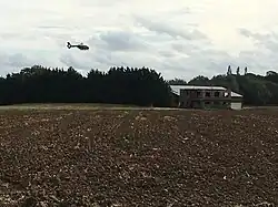 Police helicopter landing at former RAF Husbands Bosworth (2019)
