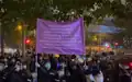 Police officers raised the purple flag after someone shouting slogans and singing was suspected of violating national security law.