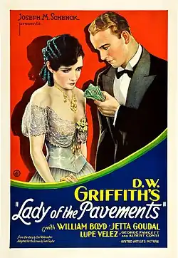 Theatrical poster showing a man and woman in formal attire looking pensive