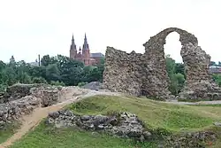 Rēzekne Castle ruins with Sacred Heart Cathedral, Rēzekne in background