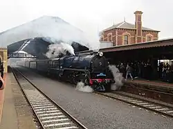 Victorian Railways R class steam train on a heritage tour at Geelong Station, run by volunteer group Steamrail Victoria