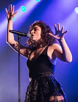 Lorde performing onstage