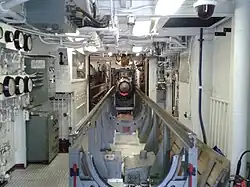 RIM-8 Talos missile loading conveyor aboard USS Little Rock.